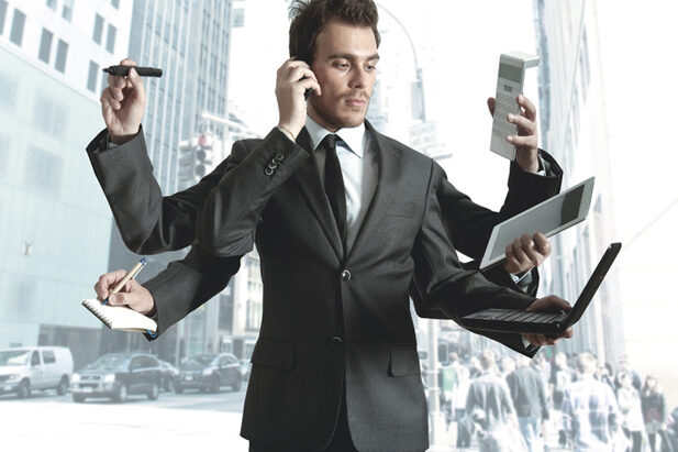Businessman multitasking